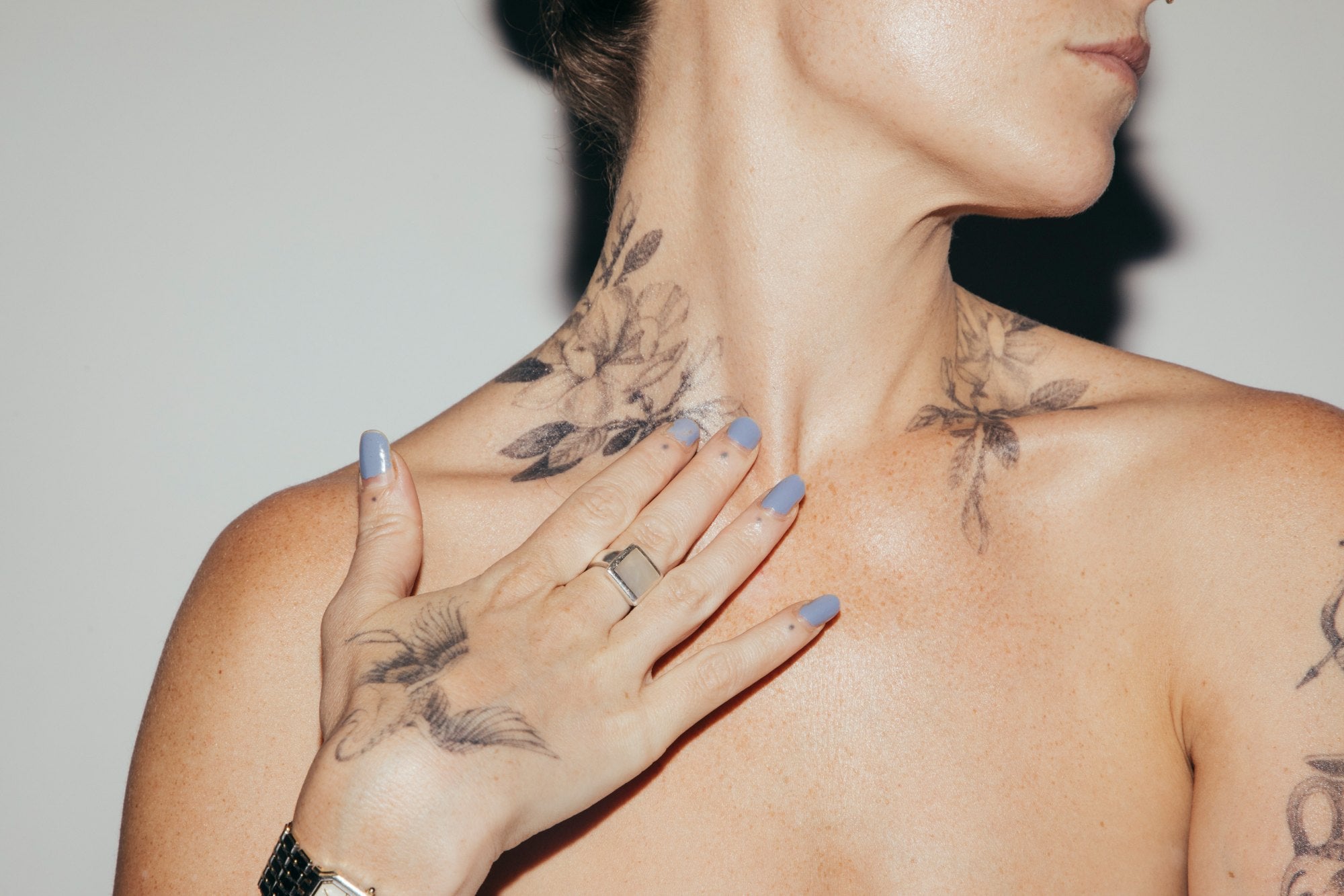 Close detail of calm skin at the shoulder and collarbone