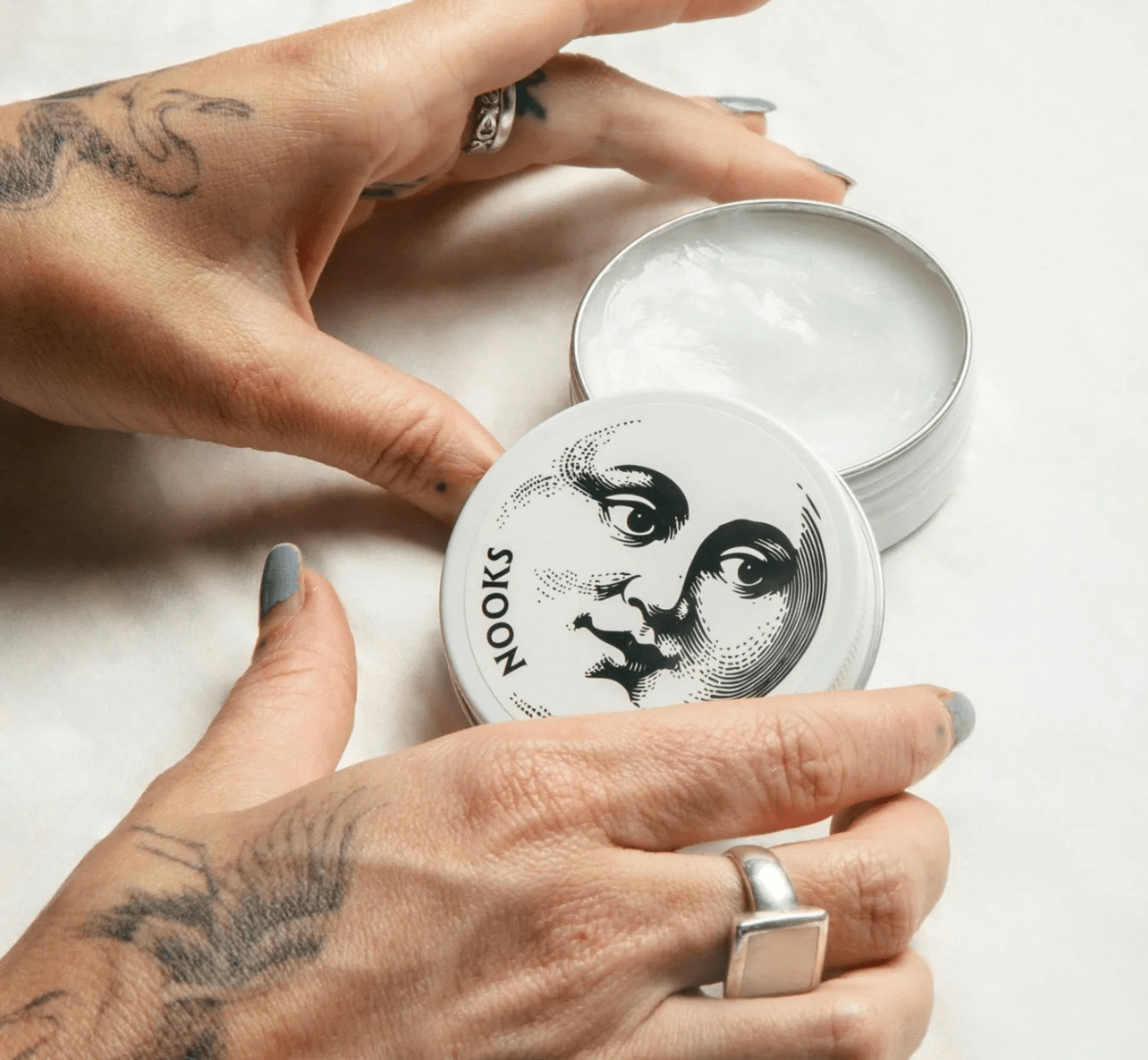 The Everywhere Balm tin on paper